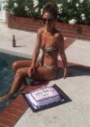 Maria Menounos - In a Bikini by the pool
